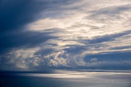 Dramatic storm clouds over open sea