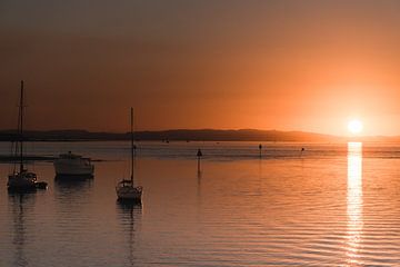 Sunset at sea by Bob Beckers