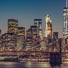 Manhattan Skyline Seen From The Manhattan Bridge At Dusk by Nico Geerlings