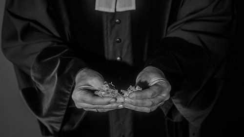 het breken van het brood