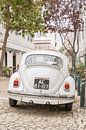 White Volkswagen Beetle in Cascais - Travel photography in Portugal by Henrike Schenk thumbnail