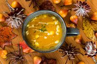 Pumpkin soup in a soup cup