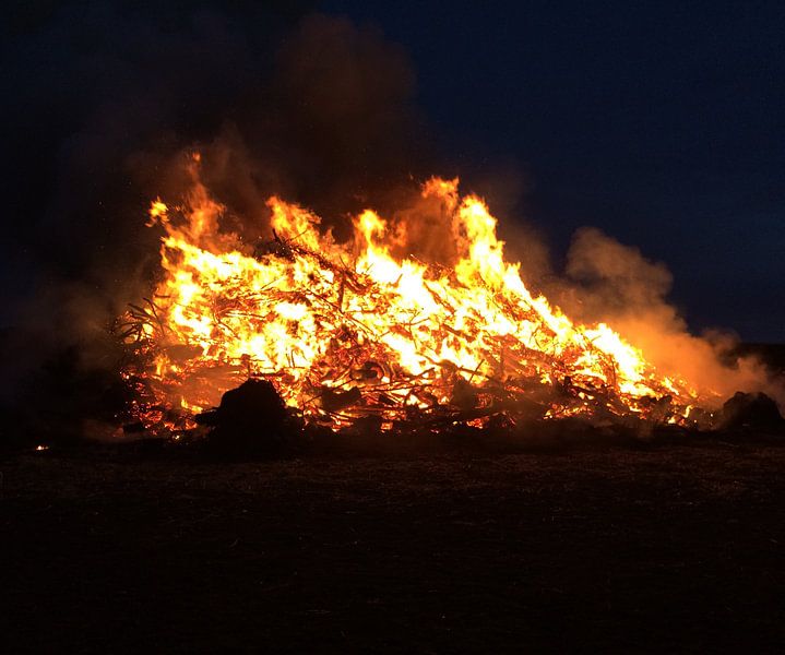 Easter bonfire at night by Roy Hoeksema