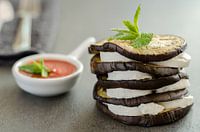 Court of aubergine, goat's cheese and tomato sauce