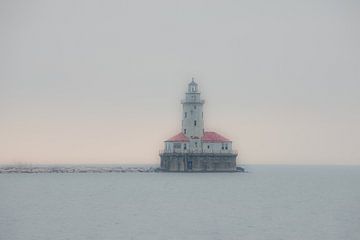 Lighthouse in the water at the end of a breakwater