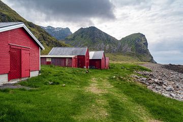 Red fishermen's huts on Unstad Beach in Lofoten, Norway by Sauerland-Fotos by Robin Deimel