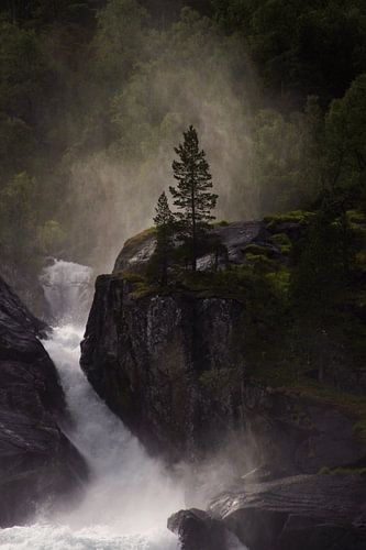Detail of a sunlit waterfall in Norway