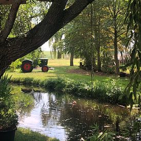 Tractor in Waterland van Michael de Boer