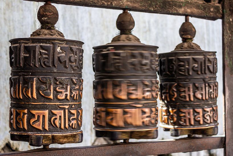 Prayer wheel in Kathmandu by Mickéle Godderis