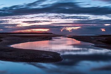 Reflections by sunset van Harald Harms