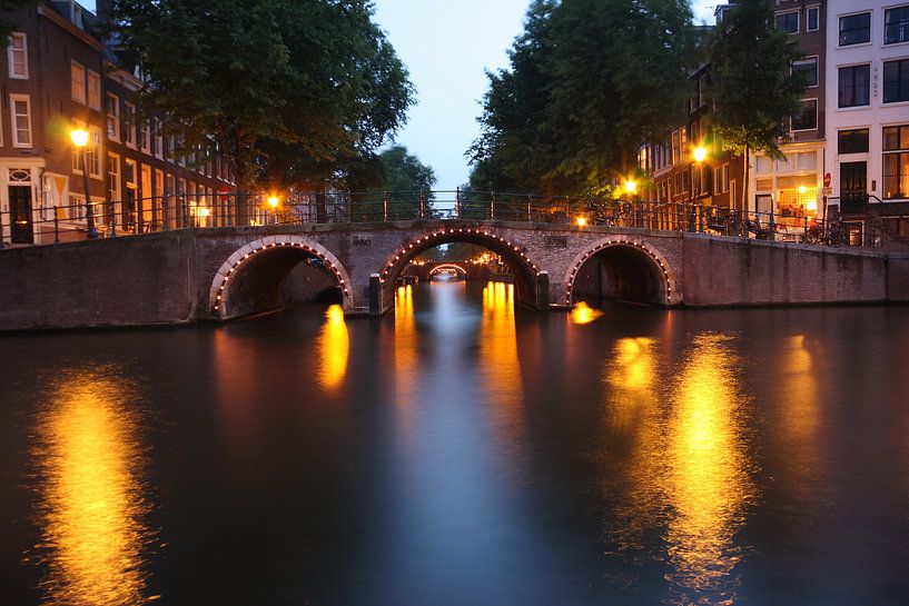 Verlichte bruggen in Amsterdam van Orhan Sahin