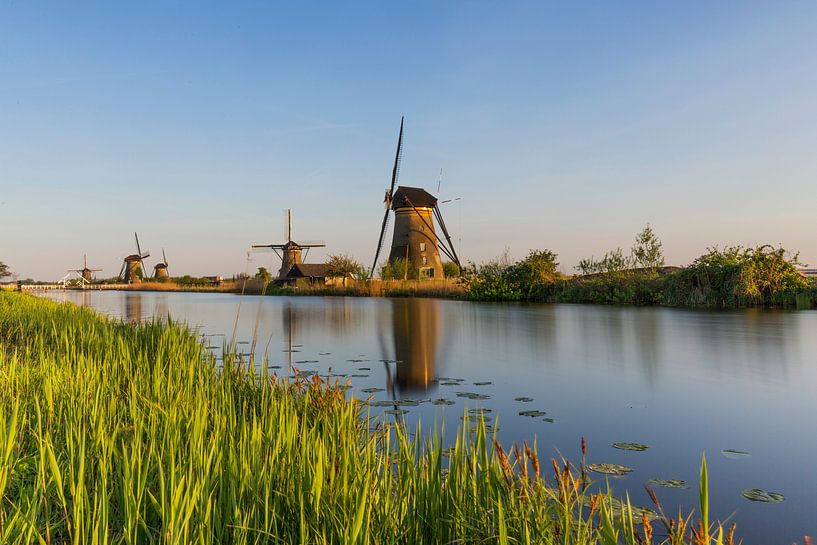 Les moulins de Kinderdijk lors d'une soirée ensoleillée sur Paul Weekers Fotografie