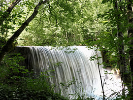 Waterfall in the green forest by Julias stille Momente