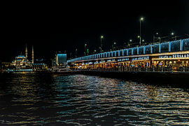 Night-time photograph of the Galata Bridge in Istanbul