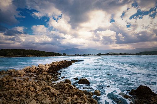 Stone pier in the evening light after a storm by Michelle Tober