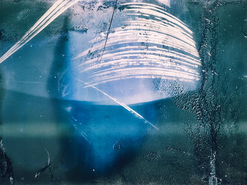 Artistic solargraph photographed with a pinhole camera