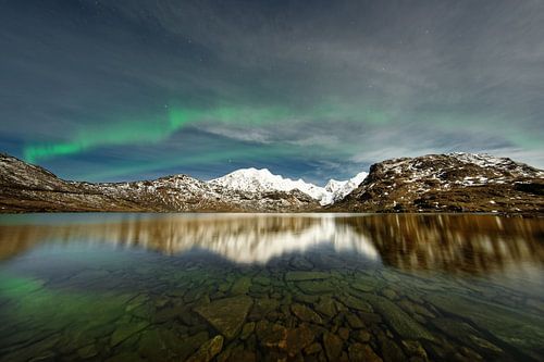 Northern lights above a mountain range