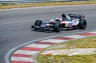 Minardi-Formel-1-Rennwagen, gefahren vom ehemaligen F1-Rennfahrer Jos Verstappen von Sjoerd van der Wal Fotografie Miniaturansicht