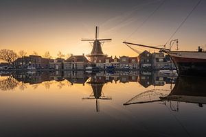 Moulin De Vlijt à Meppel reflété par le coucher de soleil