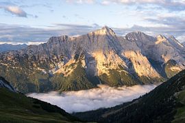 Mountain Hohe Wand at sunrise with fog in valley by Daniel Pahmeier