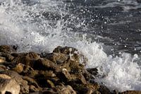 Opspattende golven