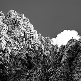 Rugged mountains in front of clouds by Stephan Zaun