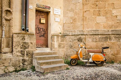 Vespa in the streets of Alghero, Italy