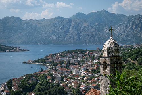 Idyllic view over the Bay of Kotor with an old church tower
