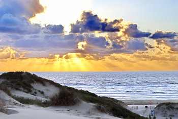 Sand dune in beautiful skies