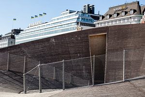 façade d'art ronde en bois à helsinki où se trouve l'office du tourisme