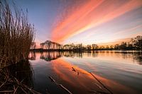 Evening red above the water of a lake