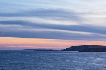 Coucher de soleil au large des îles Shetland sur Rico Ködder