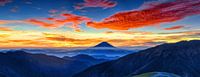 Sunrise with red clouds at Mount Fuji, Japan