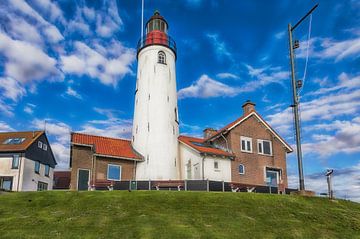 Close-up van de vuurtoren van Urk aan het Nederlandse Ijsselmeer. van Jan Schneckenhaus