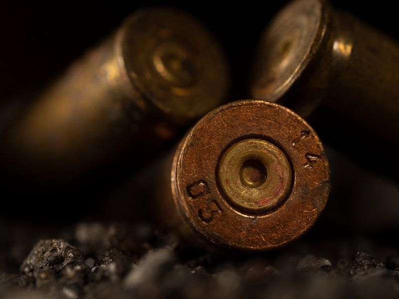 3 bullet shells close up by Robin Jongerden