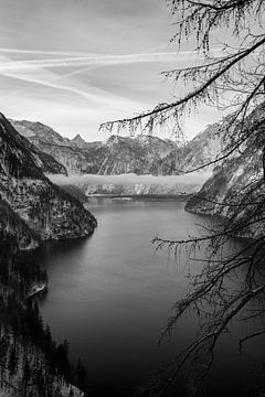 Black and white picture of the Königsee in the Berchtesgader Land with deep clouds