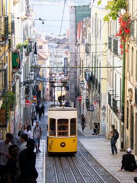 Yellow tram in Lisbon by Monique Tekstra-van Lochem