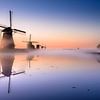 Zonsopgang boven de oer-Hollandse molens van Kinderdijk  van Alexander Mol