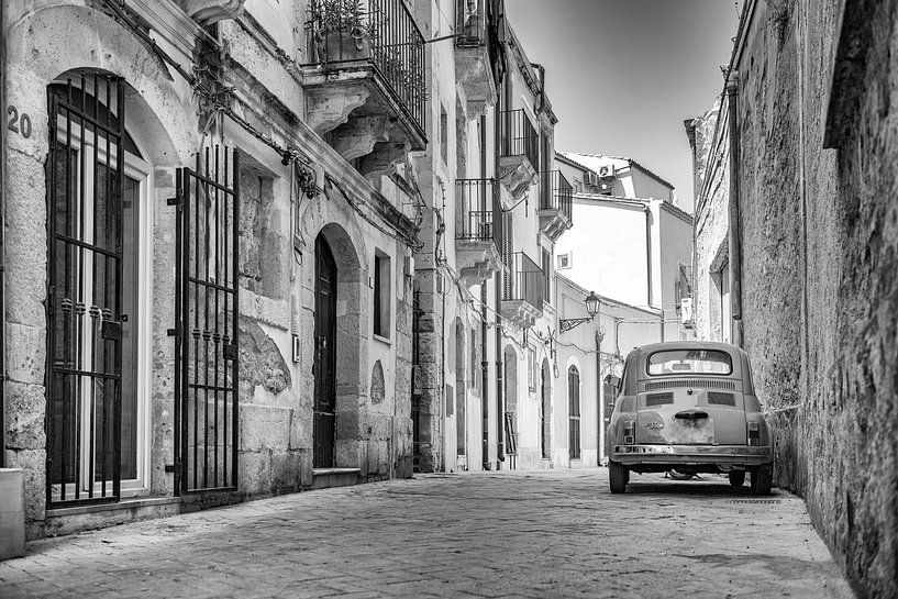 An old Fiat 500 in Syracuse, Sicily, Italy. by Ron van der Stappen