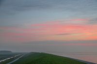 Zonsondergang bij waddenzee