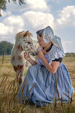 Farmer's wife with foal by Lisette van Peenen