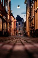 Almost empty street in Den Bosch during the evening