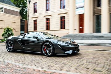 McLaren 570S sports car driving by Sjoerd van der Wal Photography