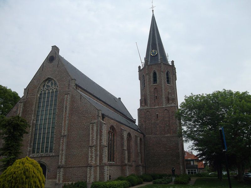 Church building Kruiningen with church tower by BEAM van de Kamp