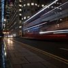 Typischer Hop-on-Hop-off-Bus auf Canary Wharf von Matthijs Noordeloos