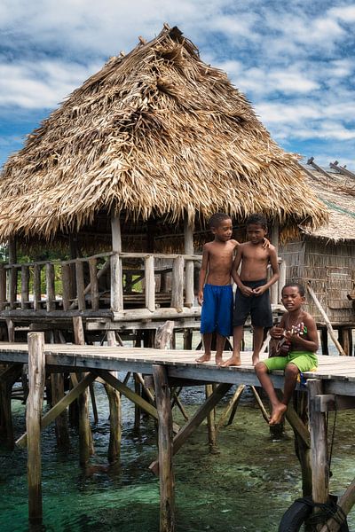 Children on Arborek island by Anges van der Logt