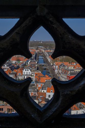 Looking through an ornament of the Nieuwe Kerk Delft