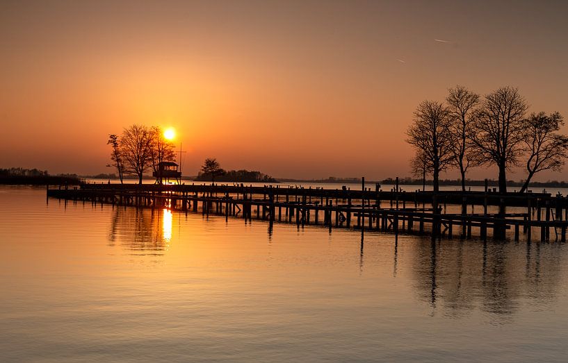 Jetty in the evening sun by Bert ten Brink