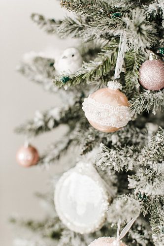 Pink Christmas baubles and winter lights