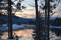 sunrise in snowy landscape